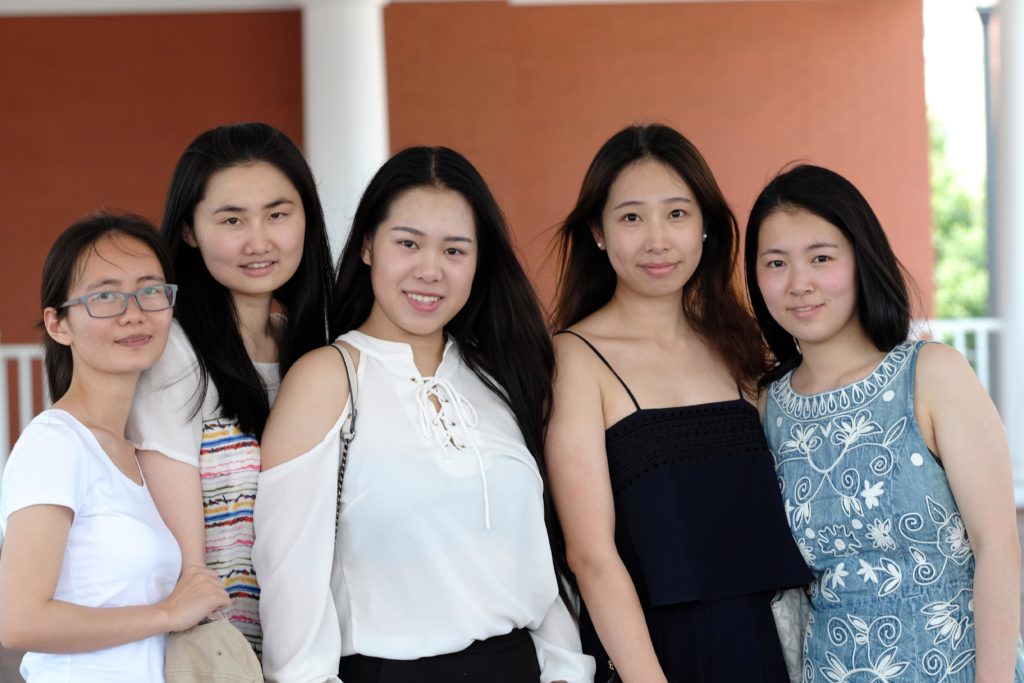  A Group of asian female students from the Data Analytics program posing for the camera 