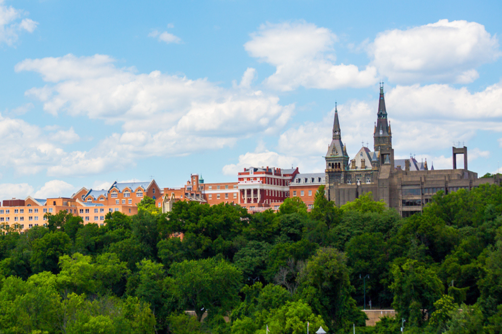 The skyline of Georgetown with trees in the foreground.