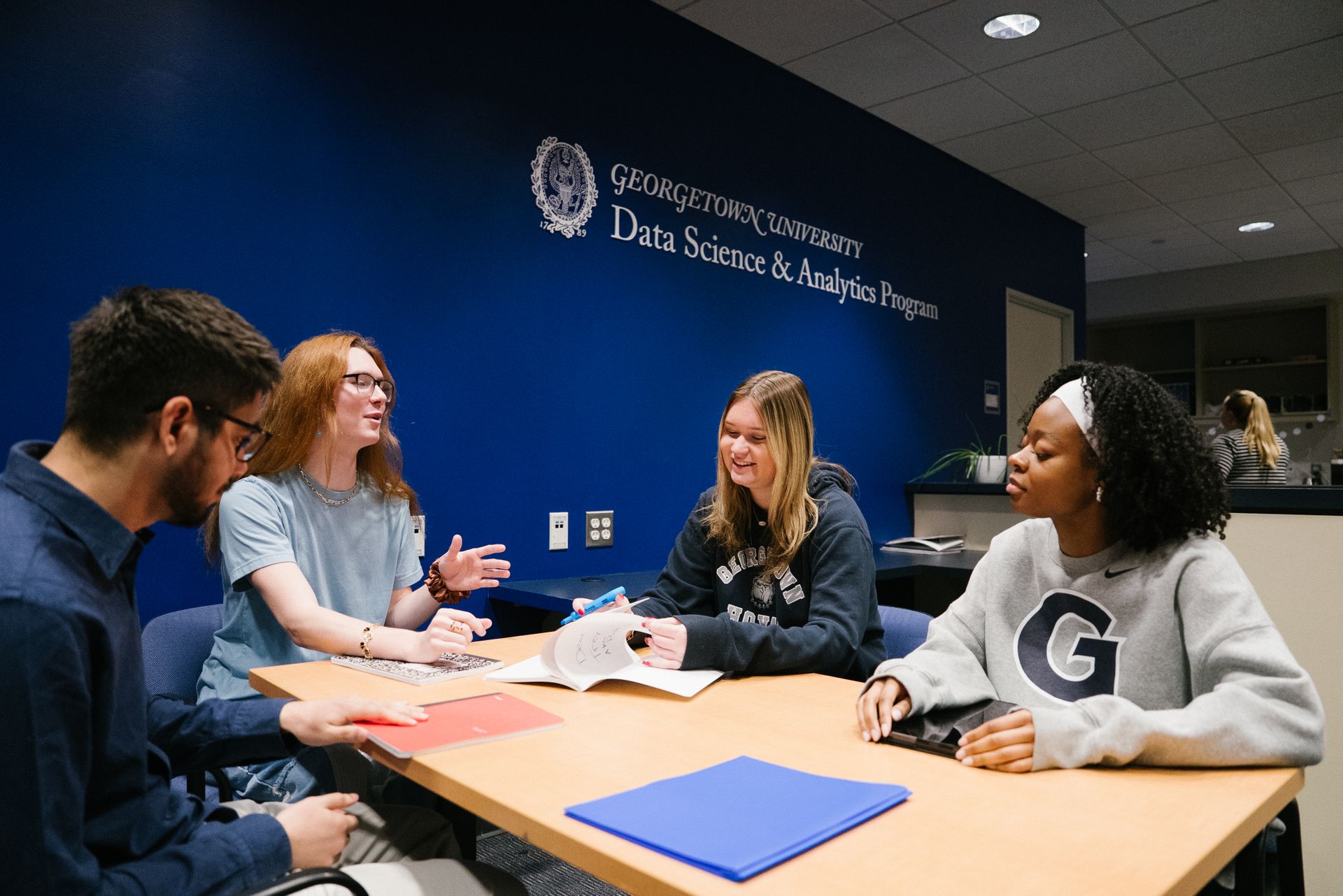 Four students studying in the DSAN department.