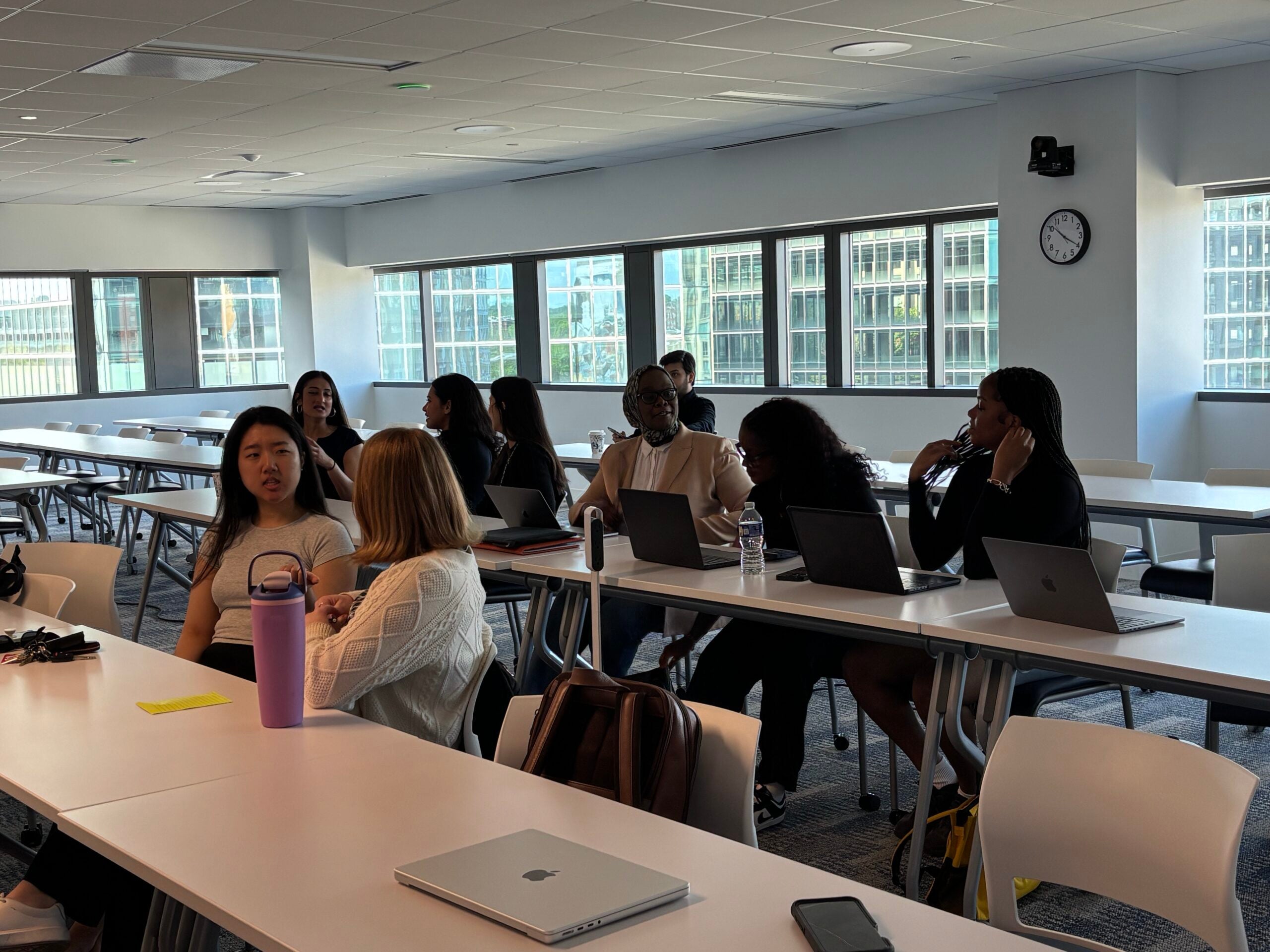 Attendees mingle before the event starts